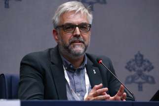 Belgian Deacon Geert De Cubber, a member of the Synod of Bishops on synodality, speaks during a news conference at the Vatican Oct. 9, 2024.