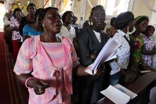 South Sudanese Catholics pray during Mass in 2011 at a church in Juba. Pope Francis has donated about $500,000 dollars to church charities in the violence-afflicted country to show solidarity.