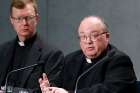 Jesuit Father Hans Zollner and Archbishop Charles J. Scicluna of Malta, members of the organizing committee for the Feb. 21-24 Vatican meeting on the protection of minors in the church, lead a press conference to preview the meeting at the Vatican Feb. 18, 2019. 