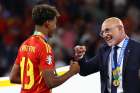 Spain&#039;s Lamine Yamal, left, the youngest soccer player and scorer in the history of European Championships, celebrates his team&#039;s July 14, 2024, win in its final game over England with Spanish soccer national team coach Luis de la Fuente. Lamine turned 17 ahead of winning the Euro 2024. Spanish bishops congratulated the team&#039;s win, especially praising de la Fuente for not shying away from his Catholic faith and manifesting it throughout the tournament and daily life.