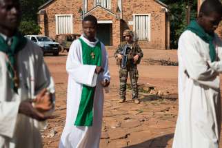 A French soldier stands guard at St. Joseph Cathedral in Bambari, Central African Republic, July 27, 2014. Two remote Catholic missions were raided by former militants in Diocese of Bouar April 4.