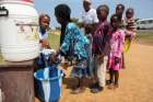 Liberian children are encouraged to wash their hands as part of an Ebola sensitization program in Monrovia, Liberia, Aug. 5. The death toll from the Ebola outbreak in Guinea, Liberia and Sierra Leone has risen to at least 932, the World Health Organizati on said Aug. 6.