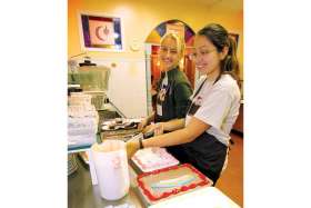 The new elementary program for religious education, Growing in Faith, Growing in Christ, presents the Catholic faith as a distinct discipline with a unique set of beliefs. It understands that Catholic education must have the effect of causing students to live their faith in the community, like these girls helping feed the poor at Toronto’s St. Francis Table.