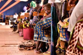 Displaced Christians attend a church service in Kaya, Burkina Faso.