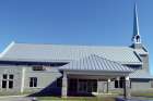 The new St. Isidore’s Church serving the French-speaking community in St. Isidore, Ont. The new building replaces the church destroyed by fire four years ago. It was consecrated and blessed by Archbishop Terrence Prendergast July 23.