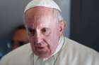 Pope Francis answers questions from journalists aboard his flight from Tallinn, Estonia, to Rome Sept. 25. 