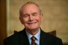 Martin McGuinness, Northern Ireland&#039;s former deputy first minister and former IRA leader-turned-peacemaker, smiles during a Jan. 23 news conference in Belfast. McGuinness died early March 21 at age 66.