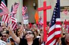 Demonstrators rally outside the federal court in Detroit June 21 before a hearing to consider a class-action lawsuit filed on behalf of Iraqi nationals facing deportation.