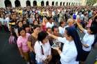 A nun marks a cross on a woman&#039;s forehead using ash during the observance of Ash Wednesday at a Catholic church in Manila, Philippines, Feb. 18. Ash Wednesday marks the start of Lent. 