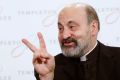 Msgr. Tomas Halik gestures during a news conference after being awarded the 2014 Templeton Prize in London March 13. Msgr. Halik, a Czech priest, was honored for his work in promoting interfaith dialogue and understanding throughout the world.