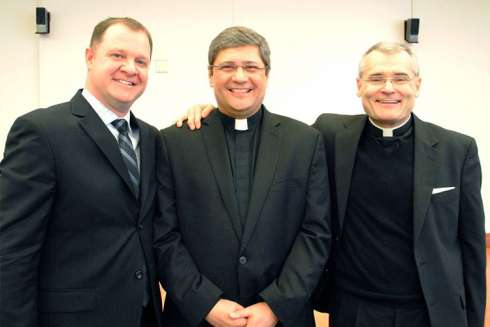 Fr. Jeff Thompson (center)