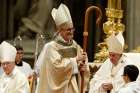 Canadian Cardinal-designate Michael Czerny walks away after receiving his miter and crosier from Pope Francis during his episcopal ordination in St. Peter&#039;s Basilica at the Vatican Oct. 4, 2019. At left is Cardinal Pietro Parolin, Vatican secretary of state.