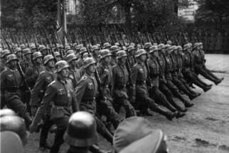 German troops march through Warsaw, Poland, in September 1939.