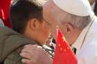 Pope Francis shared a moment with some Chinese pilgrims during his general audience March 15 who broke protocol to approach him.