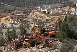 The Latin Patriarchate of Jerusalem warned of &quot;serious consequences&quot; from a new law that allows the government to seize private Palestinian lands where unauthorized Israeli settlements have been built.