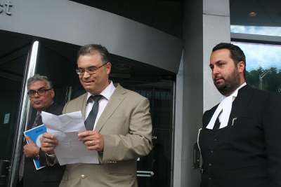 A photo of Lou Iacobelli, chair of the Parental Rights and Education Defence Fund, Dr. Steve Tourloukis, a Hamilton father of children in the Hamilton-Wentworth District School Board system and a Greek Orthodox believer, and his lawyer Alberto Polizogopoulos, right. 