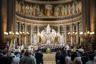 Archbishop Laurent Ulrich of Paris celebrates Mass July 19, 2024, in the iconic La Madeleine church in the heart of Paris to launch the Olympic truce in the presence of over a hundred diplomatic delegations, including one from the International Olympic Committee, led by IOC President Thomas Bach, and Paris Mayor Anne Hidalgo leading a delegation from City Hall. The feast of St. Mary Magdalene is July 22.