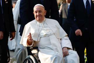 Pope Francis greets the faithful outside the Cathedral of Our Lady of the Assumption before a meeting with bishops, priests, deacons, religious, seminarians and pastoral workers in Jakarta, Indonesia, Sept. 4, 2024.