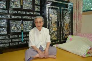 Kim Bok-dong, 88, poses for a photo in her room at a woman&#039;s shelter for &quot;comfort women&quot; in Seoul, South Korea, Aug. 19. She was among seven &quot;comfort women&quot; who had a private audience with Pope Francis before his final Mass during in South Korea the prev ious day.