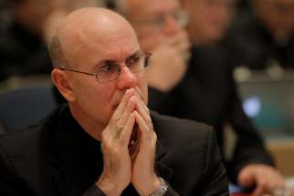 Bishop Kevin C. Rhoades of Fort Wayne-South Bend, Ind., listens to speakers Nov. 16 during the opening of the 2015 fall general assembly of the U.S. Conference of Catholic Bishops in Baltimore.