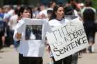 Chaldean-Americans protest June 12 outside Mother of God Chaldean Catholic Church in Southfield, Mich., after dozens of Chaldean Christians were arrested by federal immigration officials over the weekend of June 10 and 11 in the Detroit metropolitan area.