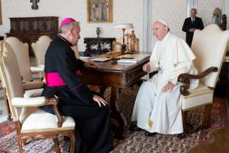 Archbishop Luigi Ventura meets with Pope Francis at the Vatican in 2018.