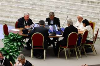 Cardinal Jean-Claude Hollerich of Luxembourg, relator general of the Synod of Bishops on synodality, speaks during the morning session in the Paul VI Audience Hall at the Vatican Oct. 15, 2024.