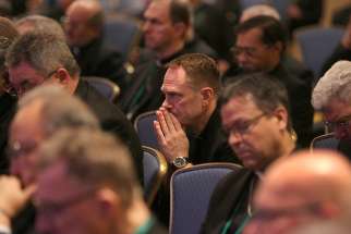 Prelates pray before the Blessed Sacrament in the chapel during a day of prayer Nov. 12 at the fall general assembly of the U.S. Conference of Catholic Bishops in Baltimore.