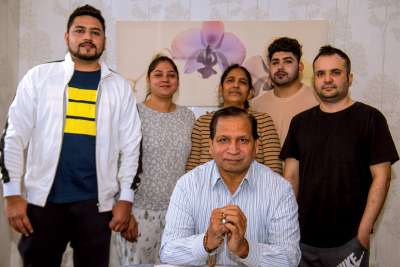 Younis Gil with his family his new home in Mississauga, Ont. The Pakistani refugee and his family fled his homeland due to a made up charge of blaspheny, first to Thailand and now in Canada, where they arrived earlier this year.