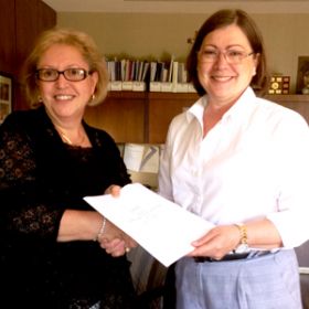 Angela and Ann: Toronto Catholic&#039;s chair of the board Ann Andrachuk and Angela Gauthier (right to left) sign the paper work finalizing Gauthier appointment to director of education as of August 1. Photo courtesy of the Toronto Catholic District School Board. 