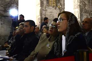 Chaldean Christians in Mosul, Iraq, attend Christmas Mass at St. Paul Cathedral Dec. 24, 2017.