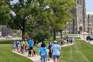 Members of the King’s University’s London Interfaith Peace Camp (LIPC) walk from King’s campus to St. Peter’s Seminary where Fr. Peter Amszej welcomed campers, staff and adult volunteers into the St. Thomas Aquinas Chapel to learn and explore more about the sacred space. 