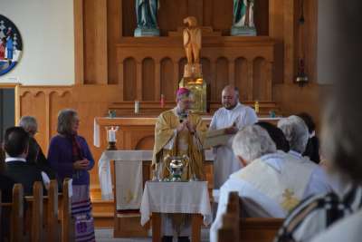 Sault Ste. Marie Bishop Thomas Dowd consecrates the oil at the annual Chrism Mass at Holy Cross Mission on Manitoulin Island.