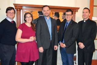 Director Jordan Allott, middle, was the guest of honour at collaboration event with chaplaincy leaders of Ryerson University, Newman Centre and St. Michaels’ College.