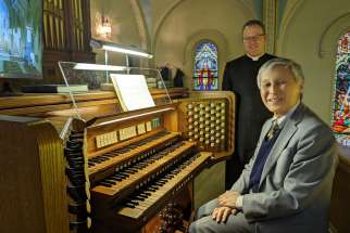 Dr. Gordon Okawara is with Fr. Jeff Oehring, pastor of  St. Ann&#039;s Catholic Church in Hamilton. Okawara has been the pariah&#039;s long-time organist.