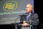 Len Rhodes, president of the Edmonton Eskimos, speaks at the Edmonton Catholic Social Services general meeting Sept. 17. 