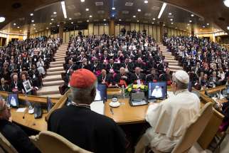 Pope Francis speaks April 4 to participants at a Vatican conference marking the 50th anniversary of Blessed Paul VI&#039;s encyclical on development, &quot;Populorum Progressio.&quot; At left is Cardinal Peter Turkson, president of the Pontifical Council for Justice and Peace.
