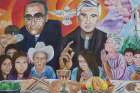 A mural in El Paisnal, El Salvador, seen in this Jan. 29 photo, features Blessed Oscar Romero and town native Father Rutilio Grande, surrounded by rural men, women and children, the community.