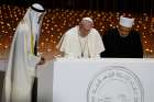 Sheik Mohammed bin Zayed Al Nahyan, crown prince of United Arab Emirates, Pope Francis and Sheik Ahmad el-Tayeb, grand imam of Egypt&#039;s al-Azhar mosque and university, sign documents during an interreligious meeting at the Founder&#039;s Memorial in Abu Dhabi, United Arab Emirates, Feb. 4, 2019. 