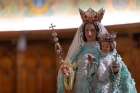 A statue of Our Lady of Consolation stands in the sanctuary of the Basilica and National Shrine of Our Lady of Consolation in Carey, Ohio.