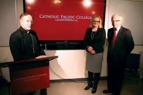 Vancouver Archbishop J. Michael Miller, CSB, alongside Catholic Pacific College president Christine Jones and Trinity Western University president Bob Kuhn. 