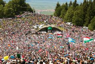Pope Francis will visit the region’s largest Marian shrine in Romania June 1, where an annual Pentecost Saturday pilgrimage draws thousands, mainly ethnic Hungarians, to Csíksomlyo (Hungarian) or Sumuleu Ciuc (Romanian) as seen in this 2018 photo. 