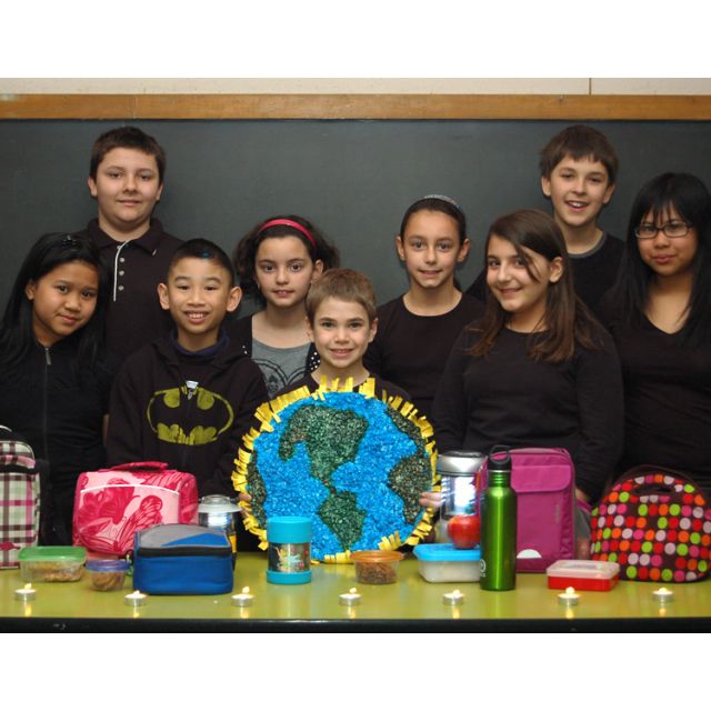Students from various grades of St. Ambrose Catholic School show off their &quot;litterless lunches&quot;, highlighted as part of Earth Hour 2012.
