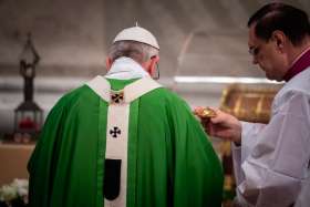 Pope Francis uses incense to venerate the relics of two married couples who have been declared blessed by the church as he arrives to celebrate a Mass to open the extraordinary Synod of Bishops on the family in St. Peter&#039;s Basilica at the Vatican Oct. 5. The pope venerated relics of Blessed Louis and Zelie Martin, parents of St. Therese of Lisieux, and Blessed Luigi and Maria Beltrame Quattrocchi.