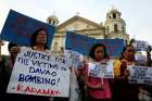 Filipino women hold placards during a Sept. 3, 2016, protest in Manila condemning the bombing at a market in Davao. Experts cite a heightened danger for more than 150 million Catholics and other Christians across South and Southeast Asia following the April 21, 2019, Easter bomb attacks that killed more than 250 people and injured 500. 