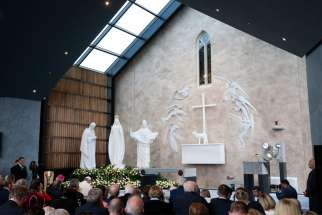 Pope Francis is pictured in a file photo praying as he visits the Chapel of the Apparitions at the Knock Shrine in Knock, Ireland. Because of the COVID pandemic, the Marian shrine has announced it will close Aug. 14-16 to discourage pilgrims from coming for the feast of the Assumption, usually its busiest day of the year.